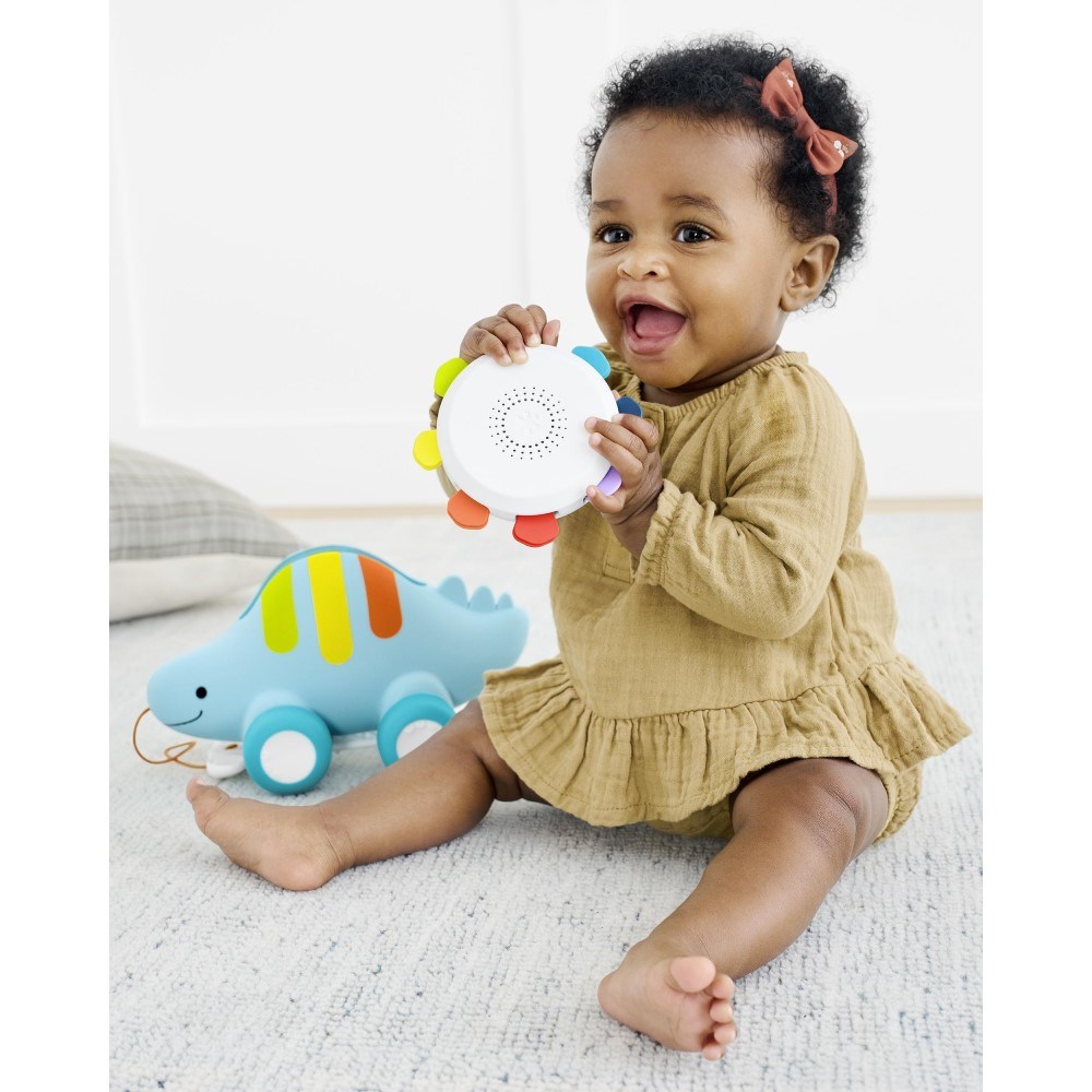Skip Hop Explore & More Dinosaur 3'ü 1 arada Bebek Müzikli Çekmeli Oyuncak 
